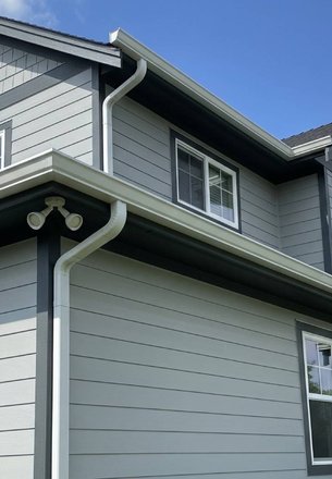 surface-tension leaf guard system on a Houston home