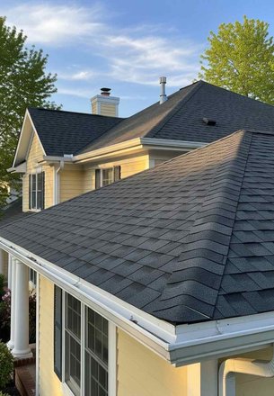 replacement roof system with proper ridge vent and flashing