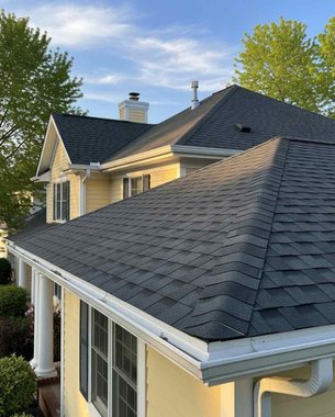 vented aluminum soffit panels installed under a Houston roof overhang