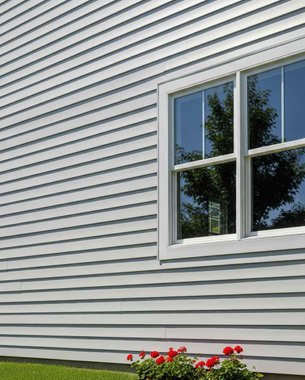 close-up of perforated soffit panels delivering attic ventilation