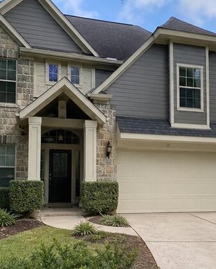 stone and siding front of a two-story home