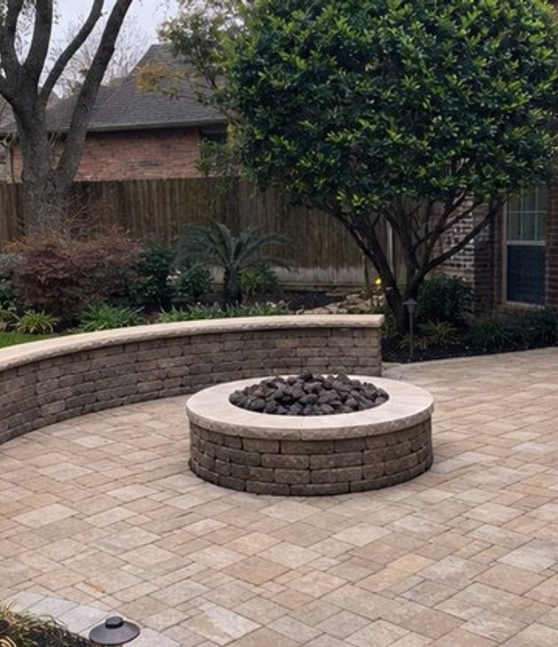 stone fire pit installation by Saul's Home Improvement in Houston