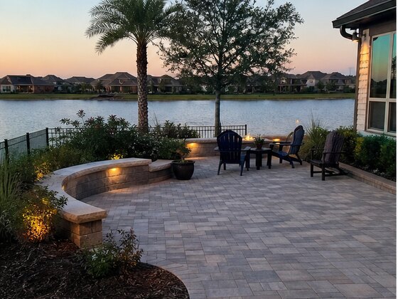 completed lake view paver patio in Towne Lake Cypress TX